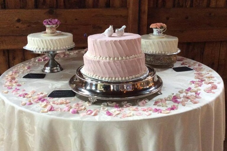 3 tiered cakes on a table